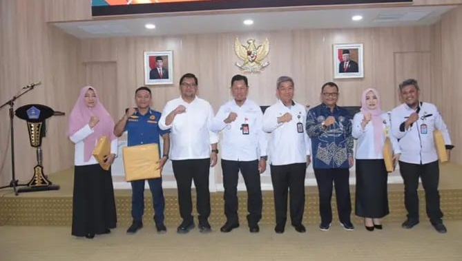 Sekretaris DPRD Kota Kendari Hadiri Sosialisasi Penggunaan QRIS Mobile Banking Bank Sultra Bagi ASN Pemkot